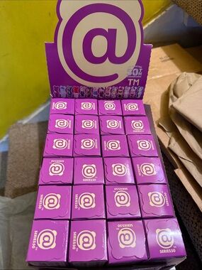 Series 50 Blind Box Collectible - Purple @ Logo